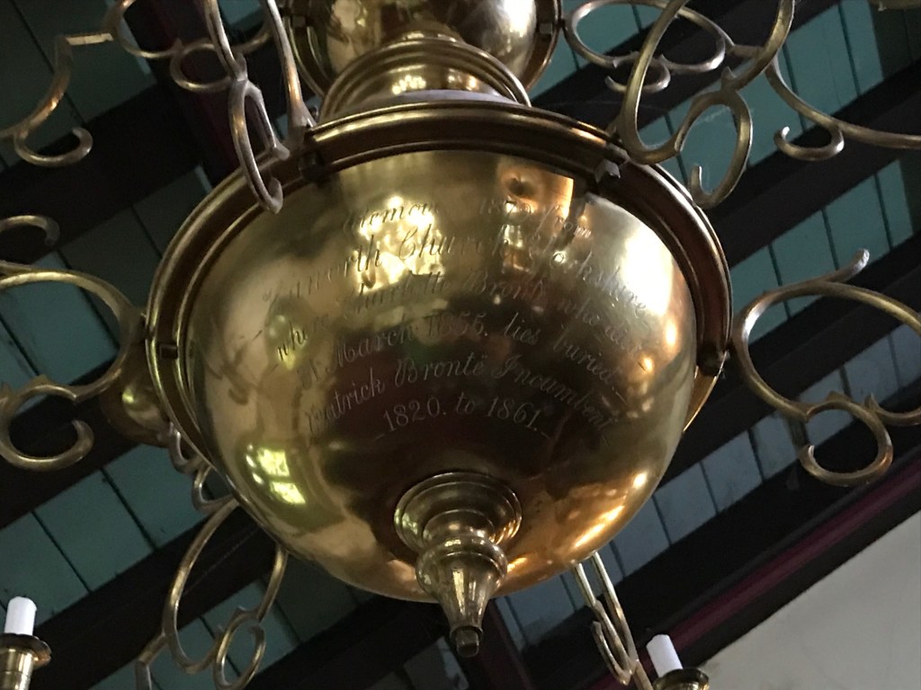 Close up of the dedication on the chandelier which, as far as I can make out, includes the names of the Bronte family. 
