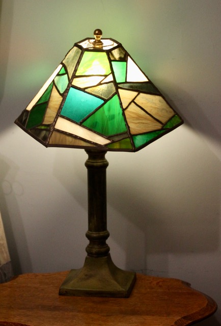 Close up of the chandelier of the lamp made from coloured glass. 
