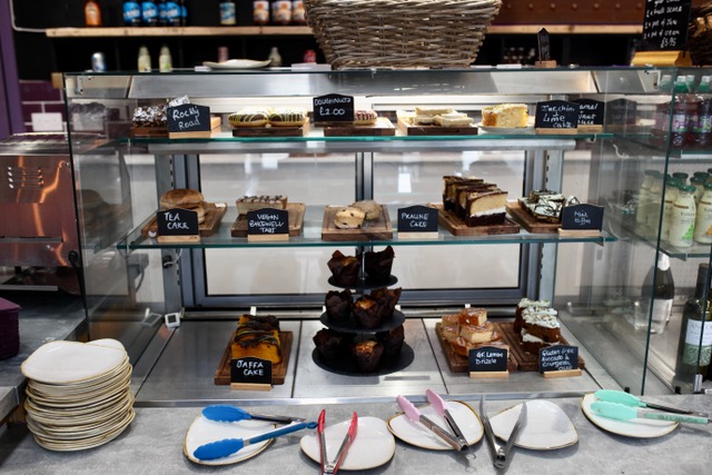 the dessert cabinet with a wide selection of cakes at Mabel's Cafe.