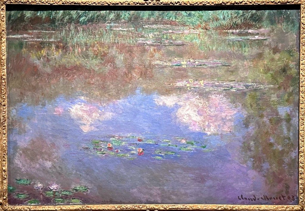 Picture caption: This is a closer photograph of the same Water Lilies painting with very little of the frame showing.